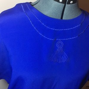 Unique dress blouse with collar embroidery